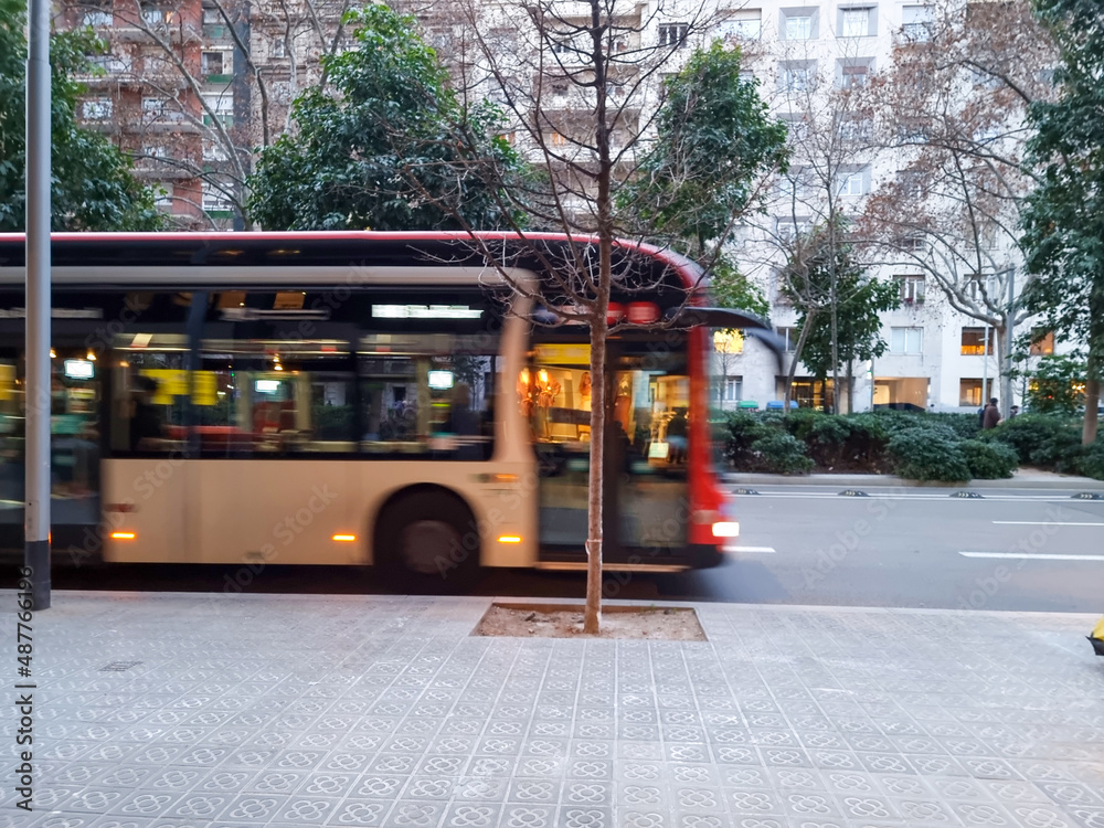 Bus in motion in the city of Barcelona, Spain