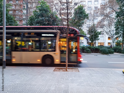 Bus in motion in the city of Barcelona, Spain © juanorihuela