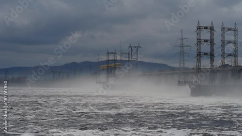 water discharge at hydroelectric power stations. waves and splashes of the Volga river. Zhigulevskaya hydroelectric power station. high water. electricity generation.