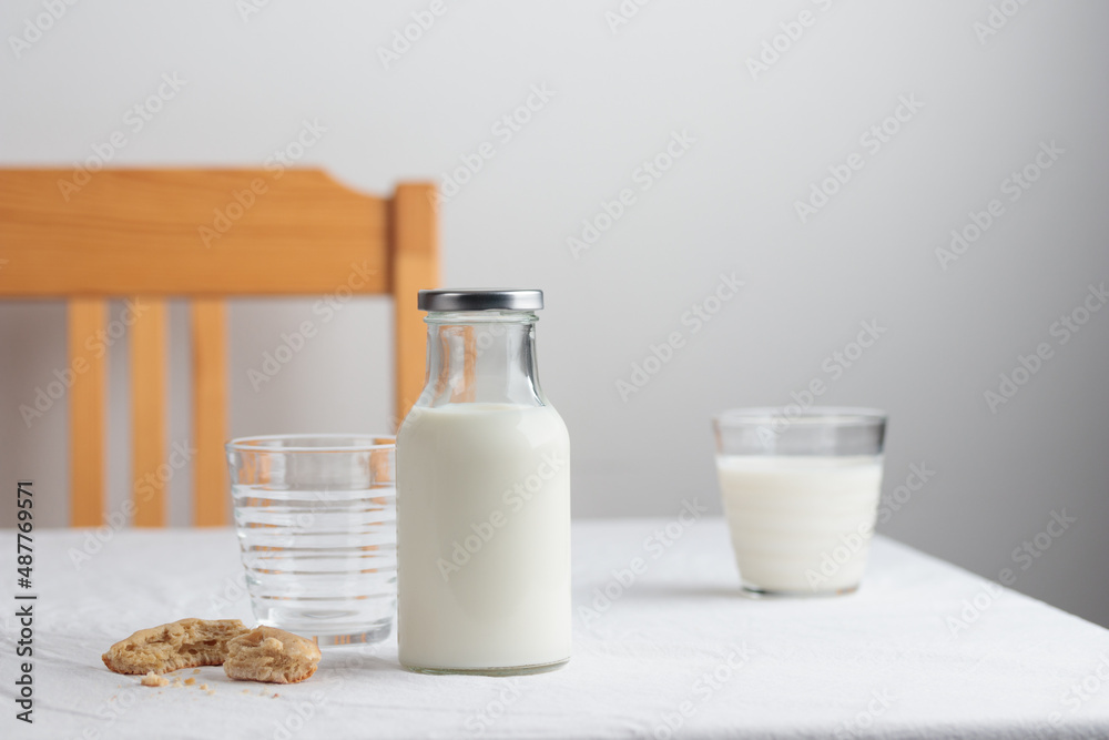 Fresh Milk on the table with white tablecloth