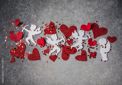 Little red hearts and white amour on light background for Happy Valentine's Love pattern