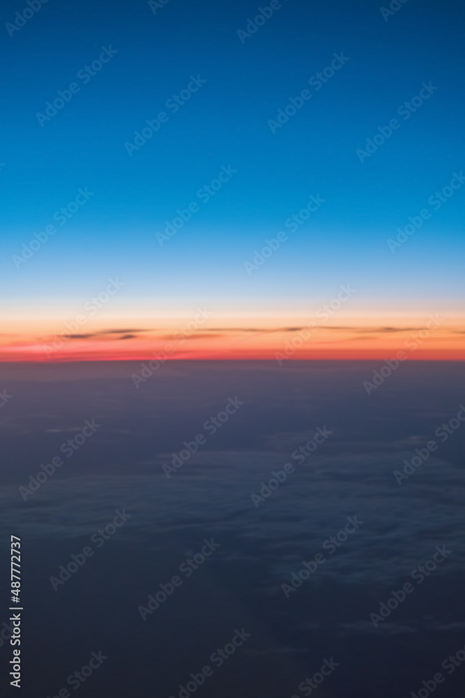 blurry sunset landscape through porthole