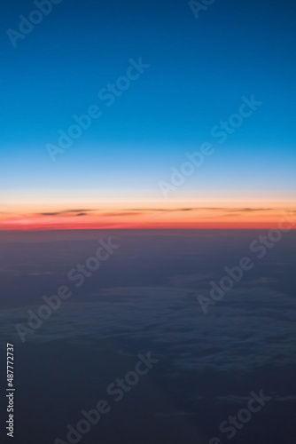 blurry sunset landscape through porthole