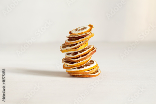 A stack of dried lemon slices. healthy snack