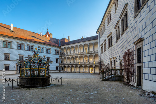The historical castle complex in old town of Jindrichuv Hradec city. View of courtyard with a fountain. It is the third largest castle complex in the Czech Republic