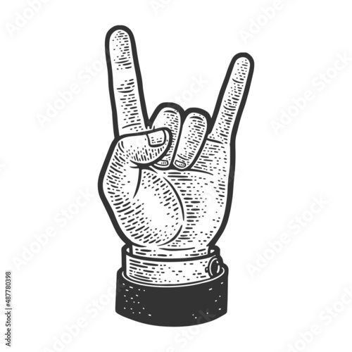 Sign hand rock and roll heavy metal on white background sketch engraving vector illustration. Sign of horns hand gesture. T-shirt apparel print design. Scratch board. Black and white hand drawn image