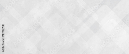 Abstract white background with diamond and triangle shapes layered in modern abstract pattern design, abstract white background with texture pattern, layered geometric triangle shapes.