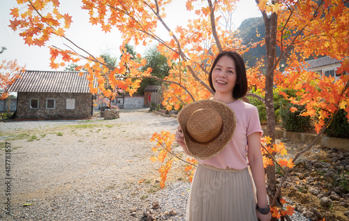 Asian woman, middle aged, 4...