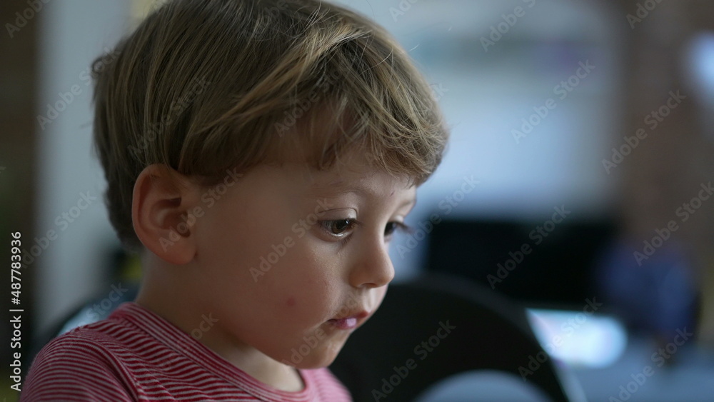Portrait of a pensive little baby boy child close-up face Portrait of a pensive little baby boy child close-up face