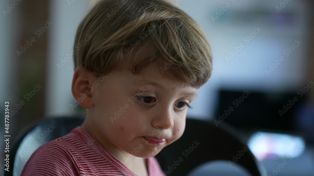 Portrait of a pensive little baby boy child close-up face Portrait of a pensive little baby boy child close-up face