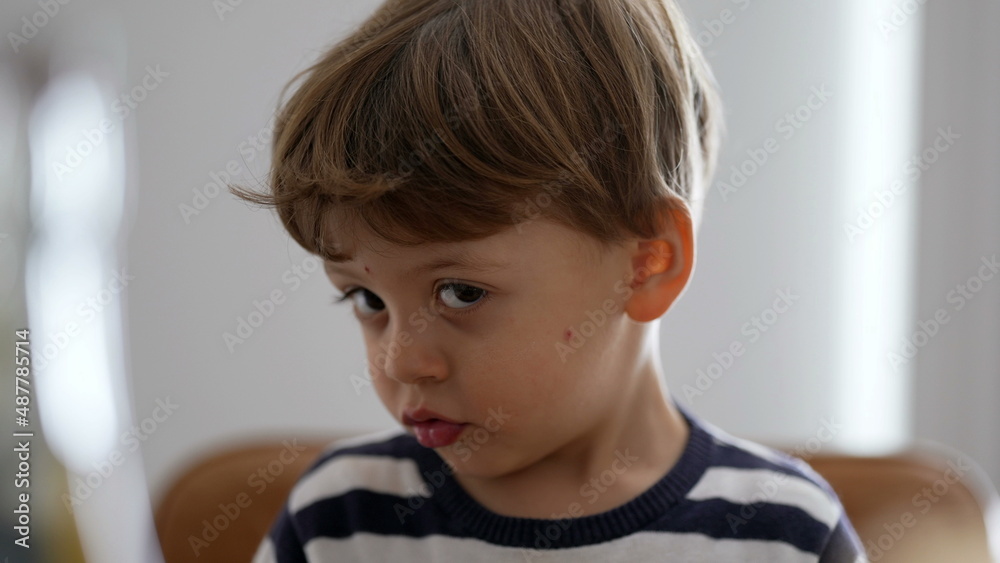 One adorable child portrait face smiling cute small boy