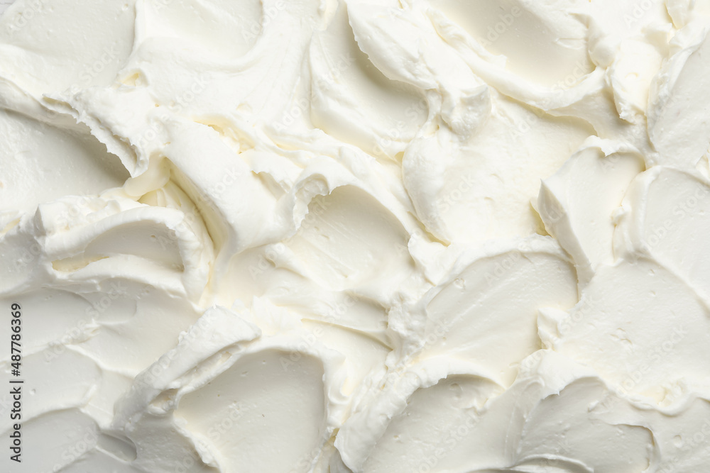 Closeup of tasty cream cheese as background, top view Closeup of tasty cream cheese as background, top view
