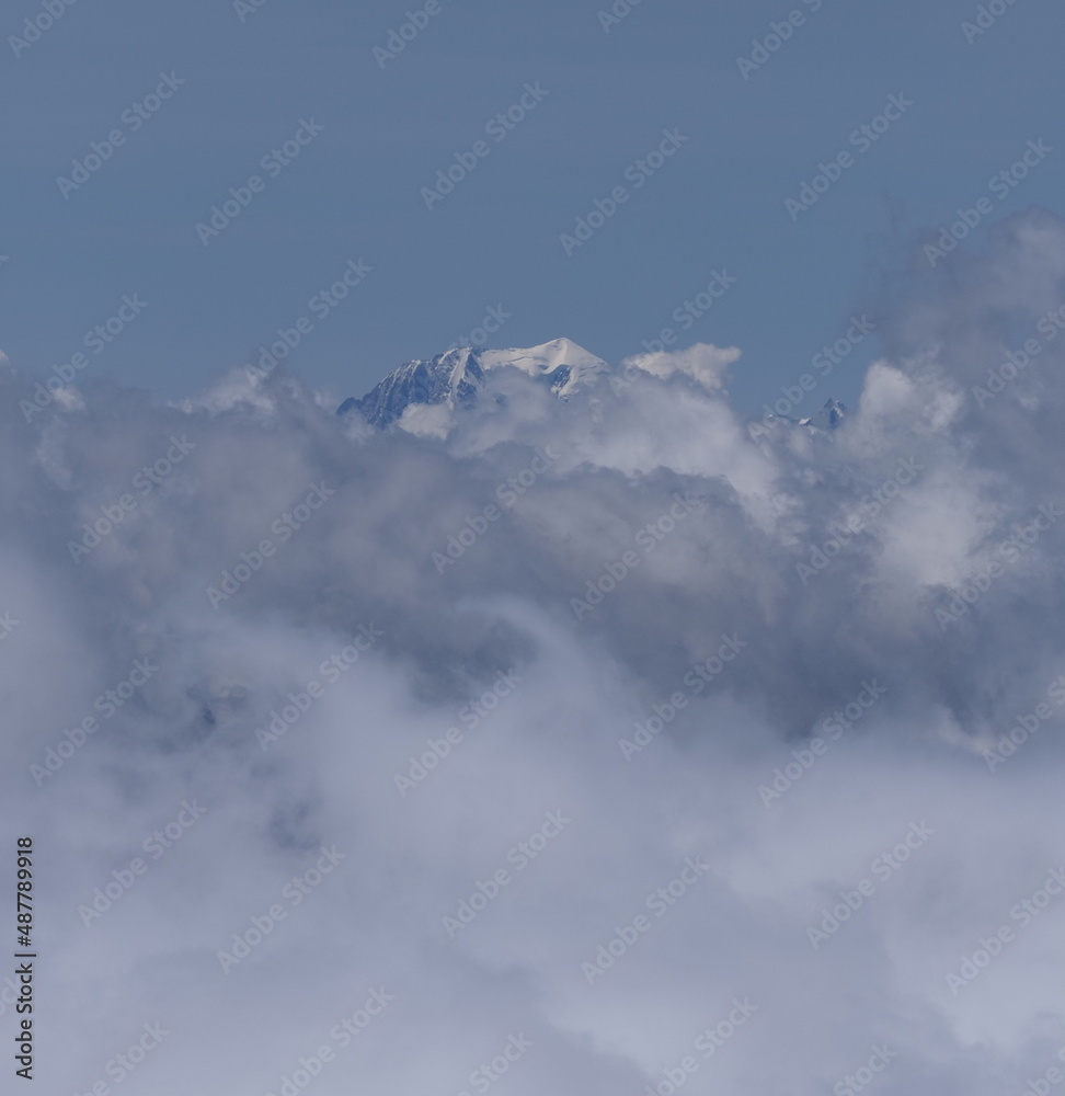 Mont Blanc peak with clouds seen from Switzerland