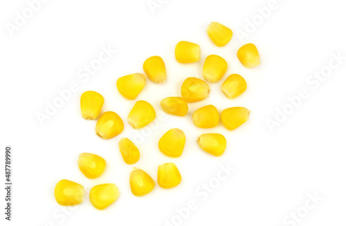 Yellow corn kernels isolated on white background	
