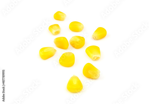 Yellow corn seeds isolated on white background 
