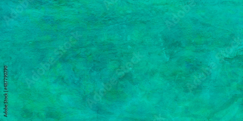 Green grungy backdrop Abstract watercolor background texture. Concrete textured background with roughness and irregularities to your design