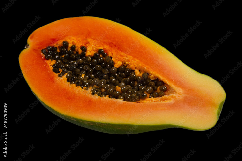 Papaya fruit isolated on a white background. Tropical fruit. Half papaya. Papaya fruit isolated on a white background. Tropical fruit. Half papaya.