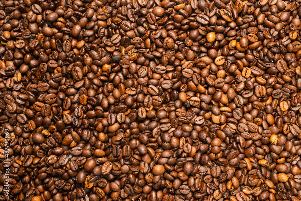 Coffee beans on a white background. Top view. Coffee beans on a white background. Top view.