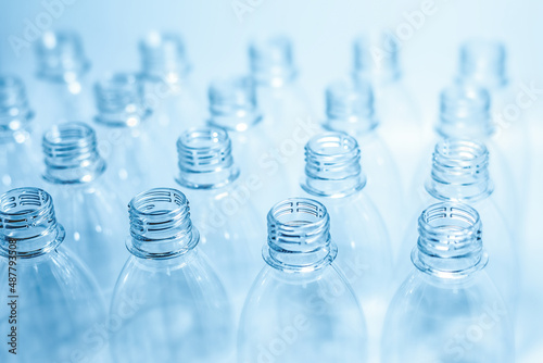 Bottling plant - Plastic bottles. Abstract background of plastic bottles. Selective focus