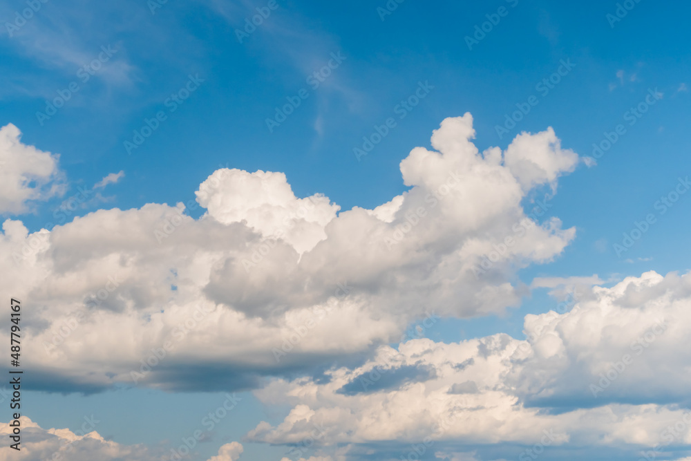 White clouds against blue sky. Daylight, cloudy day. Nature, freedom and peaceful concept