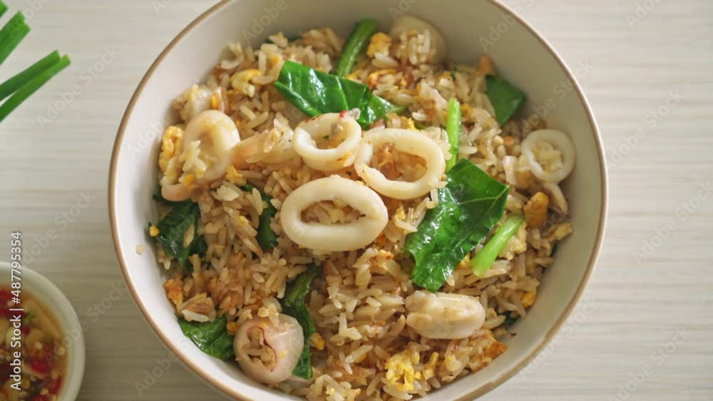 Fried rice with squid or octopus - stir-fried rice with squid, egg and kale Fried rice with squid or octopus - stir-fried rice with squid, egg and kale