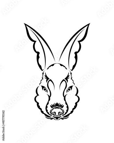 Head of a hare in tattoo style. Isolated symbol of 2023. Handmade. © Javvani