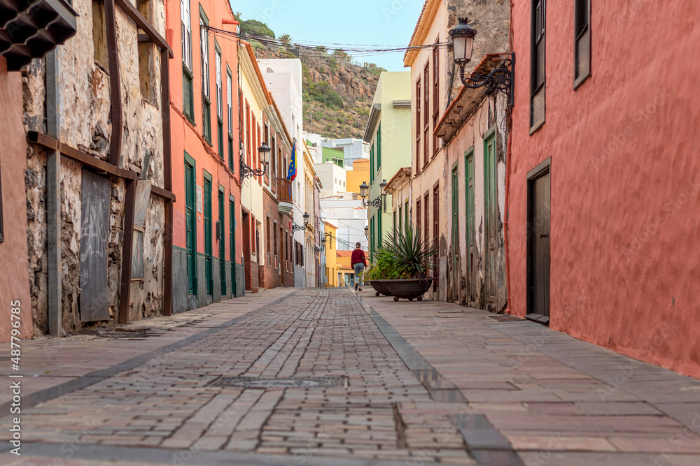 Fototapeta premium Streets and alleys in San Sebastian de La Gomera, the capital of the Canary Island of Gomera. The colorful houses stretch from the hill down to the sea
