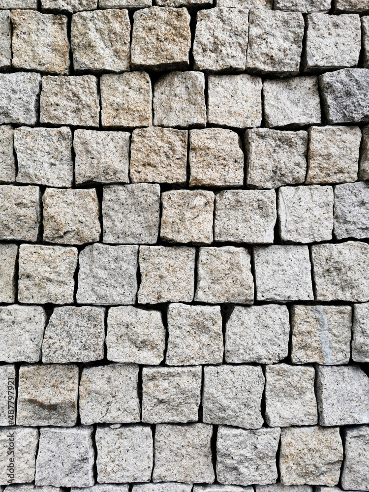 Background of rrough square bricks stacked on top of each other Background of rrough square bricks stacked on top of each other