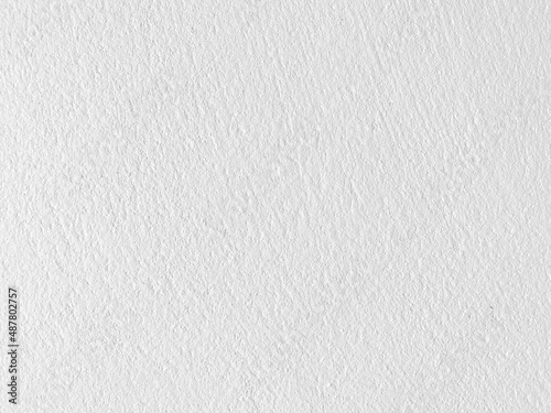 Seamless texture of white cement wall a rough surface, with space for text, for a background.