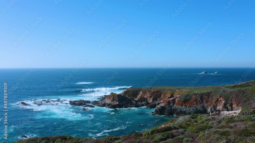 Flyover cliffs and ocean waves along the Pacific Coast. Flyover cliffs and ocean waves along the Pacific Coast.