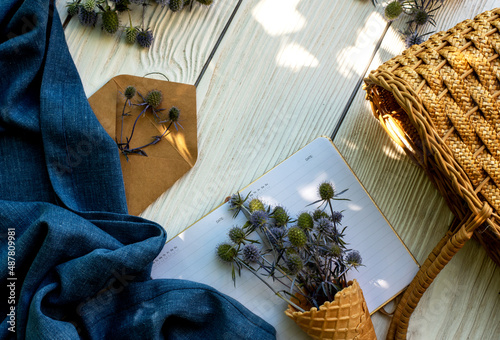 Wildflowers on a white background. Place for text. Flat lay