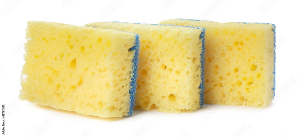Yellow cleaning sponges with abrasive light blue scourers on white background