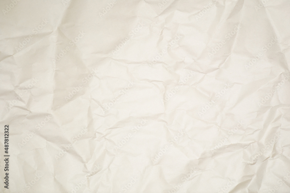 Fototapeta premium Texture background crumpled paper beige color space for text