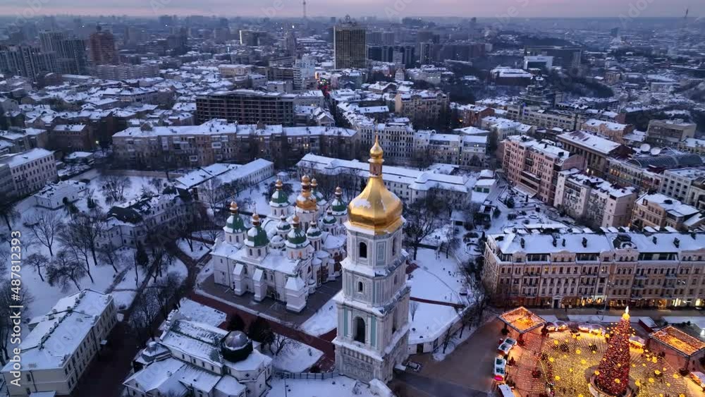 Saint Sophia Cathedra and Sofiyivska Square in Kyiv during christmas market in the winter revealing the kyiv city skyline