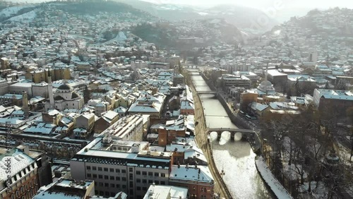 Snowy sunrise in Sarajevo, Bosnia's capital. The city is known for its siege in the 90s that lasted almost 4 years. But also from the Franz Ferdinand assassination that started ww1. photo