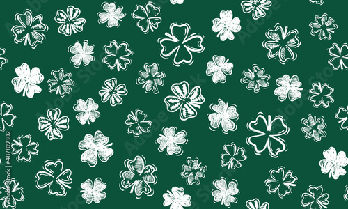 Saint Patricks Day, festive background with flying clover. 