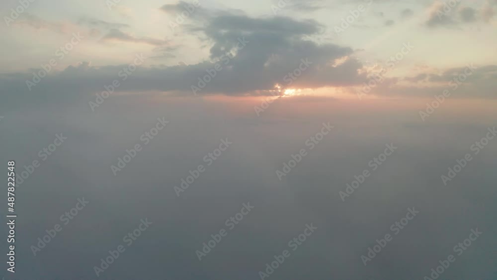 Beautiful misty dawn. Flying above the clouds, drone video Beautiful misty dawn. Flying above the clouds, drone video