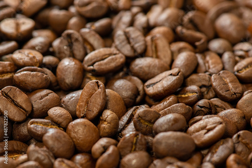 Aromatic roasted coffee beans close-up. Soft selective focus.