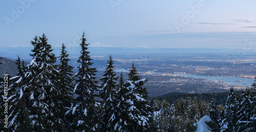 Canadian Mountain Nature Landscape with Vancouver Cityscape in background. Taken on Hollyburn Mountain, West Vancouver, British Columbia, Canada. photo