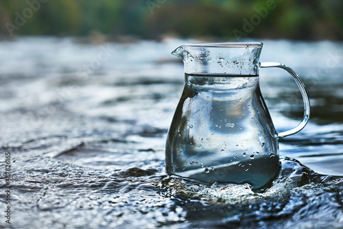 Pitcher of clean river water.