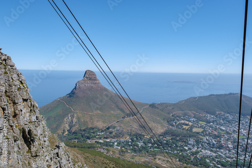 view from the Table Mountain in Cape Town South Africa, view over the ocean, and Lion's Head from Table Mountain Cape Town. 