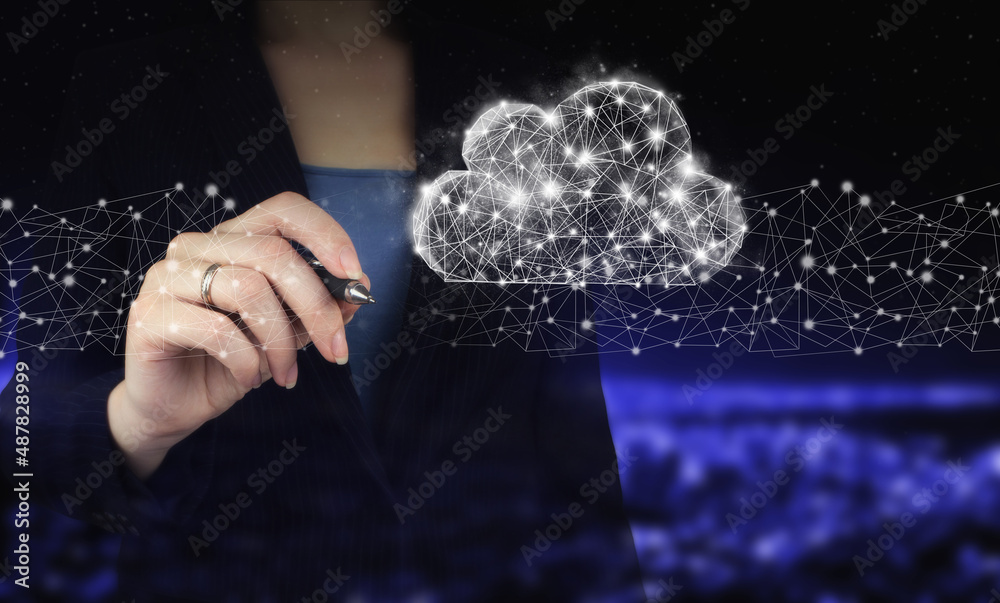 Abstract cloud technology digital. Communication network. Hand holding digital graphic pen and drawing digital hologram cloud sign on city dark blurred background.