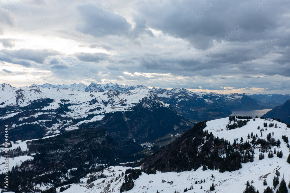 Obraz premium Amazing shot of a beautiful landscape in the alps of Switzerland. Wonderful flight with a drone over an amazing landscape in the canton of Schwyz. Epic view at a mountain called Grosser Mythen.