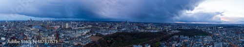 Fototapeta Naklejka Na Ścianę i Meble -  Aerial Panoramic view of London at dusk with storm clouds.