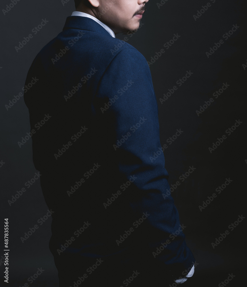 Asian standing near blank wall. Concept of businessman Asian standing near blank wall. Concept of businessman