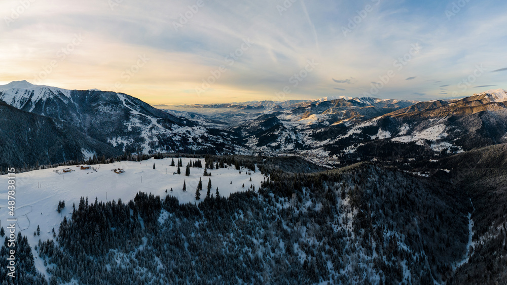 Aerial drone panoramic view of the Carpathians in winter, Romania