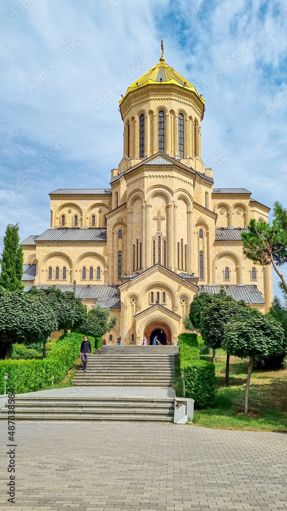Front view of the Holy Trinity Cathedral ( or Tsminda Sameda Cathedral) of Tbilisi in Georgia.  Travel Destination. Exploration. City trip. Religious building. Orthodox Church.