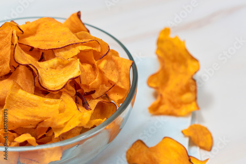 Sweet Potato Chips on an elegant marble table