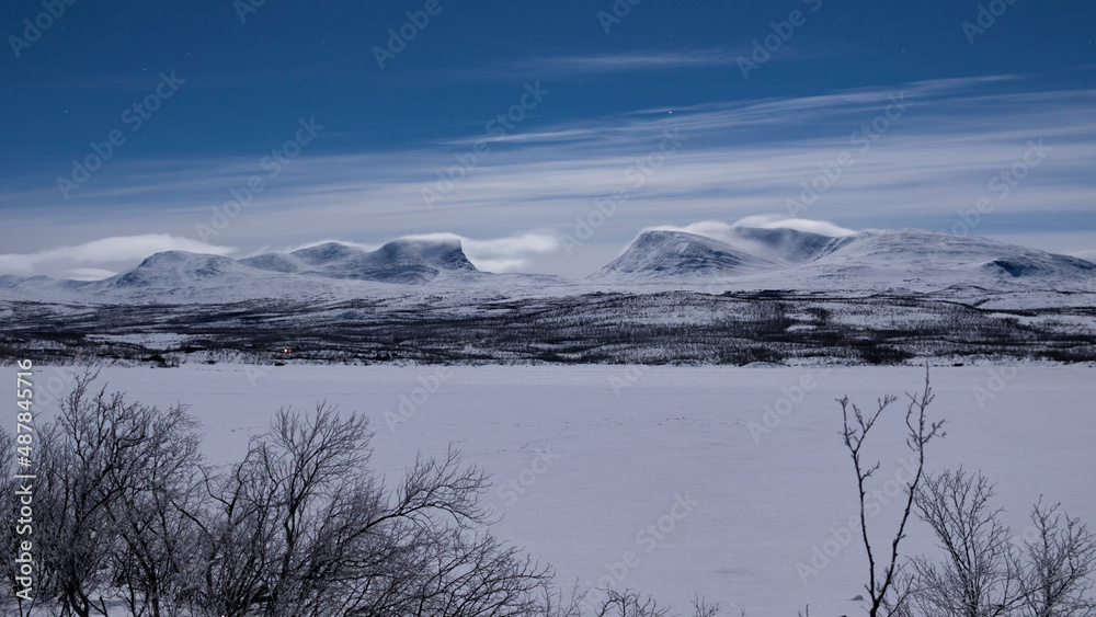 Fototapeta premium Lapporten under the moonlight. Taken in Abisko