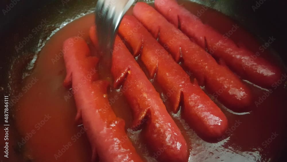 Video image of homemade hot dogs in the pot Video image of homemade hot dogs in the pot